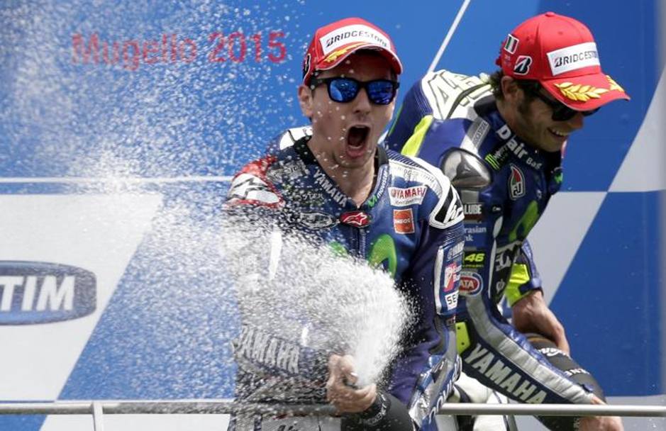 Lorenzo festeggia la vittoria al Mugello, Rossi al suo fianco. Reuters
